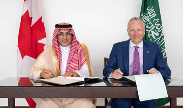 Saudi, Canadian diplomats sign deal to boost bilateral relations
