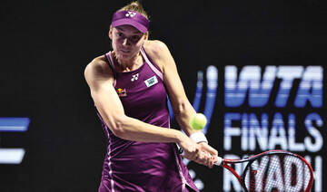 Rybakina tops Swiatek to reach semis as group winner