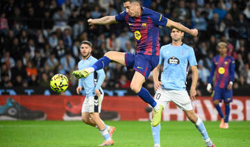 Lewandowski hat trick steers Barcelona to 4-2 win at Celta Vigo